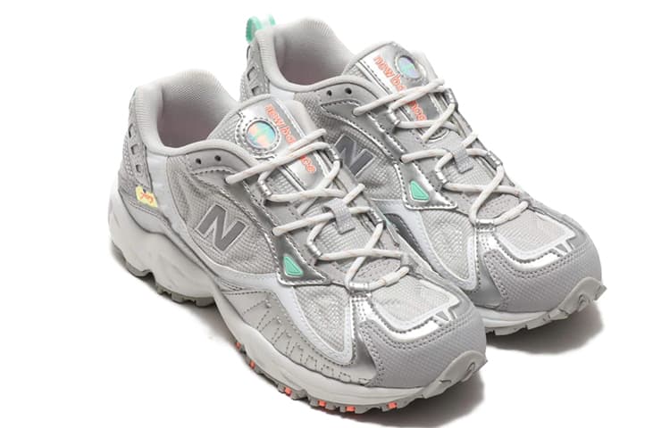 Женские кроссовки New Balance NB 703 серебристо-серые