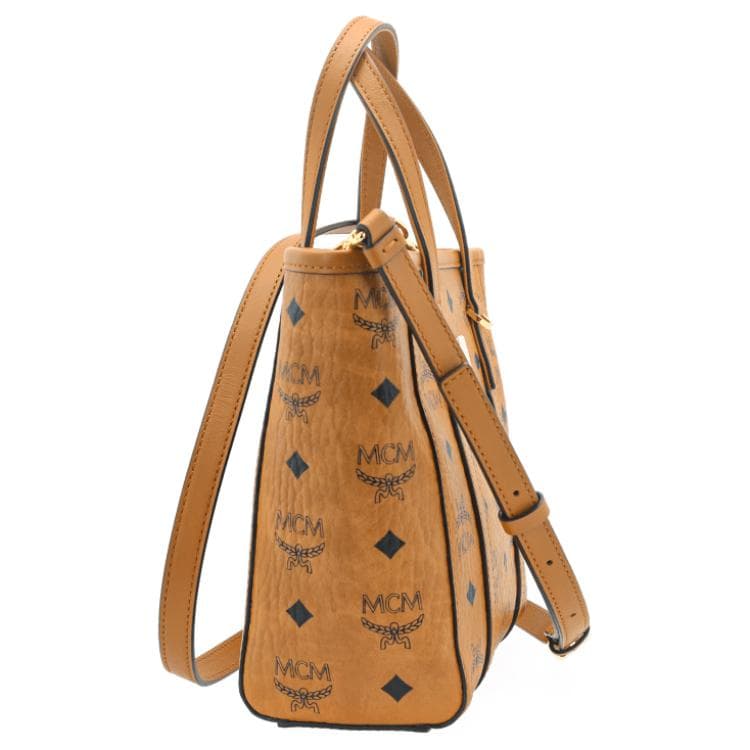 Мини-сумка-шоппер MCM Toni Visetos из парусины с монограммой и покрытием коньячного цвета