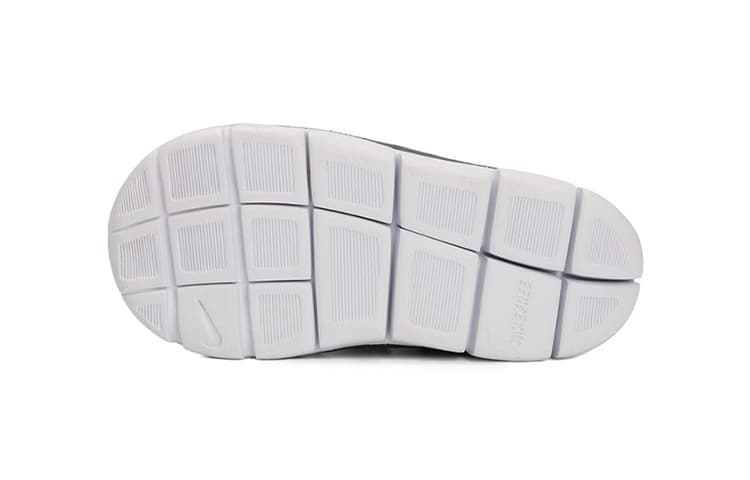 Nike Dynamo Free SE, устойчивый к скольжению, истиранию, термостойкий низкий верх Caterpillar, черный для младенцев и малышей