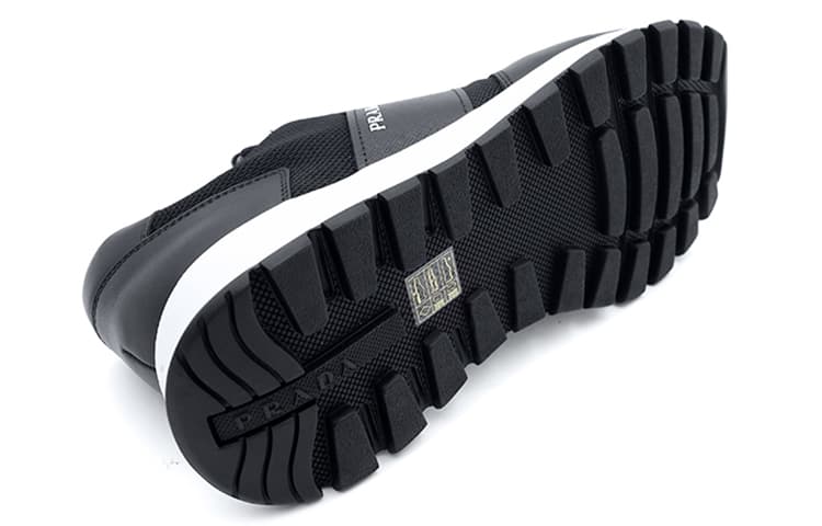 Кожаные низкие кеды PRADA Prax 1, черные