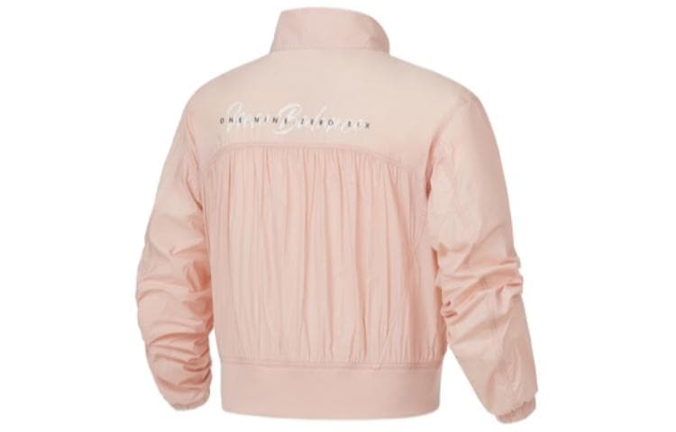 Куртки New Balance IU женские кораллово-красные