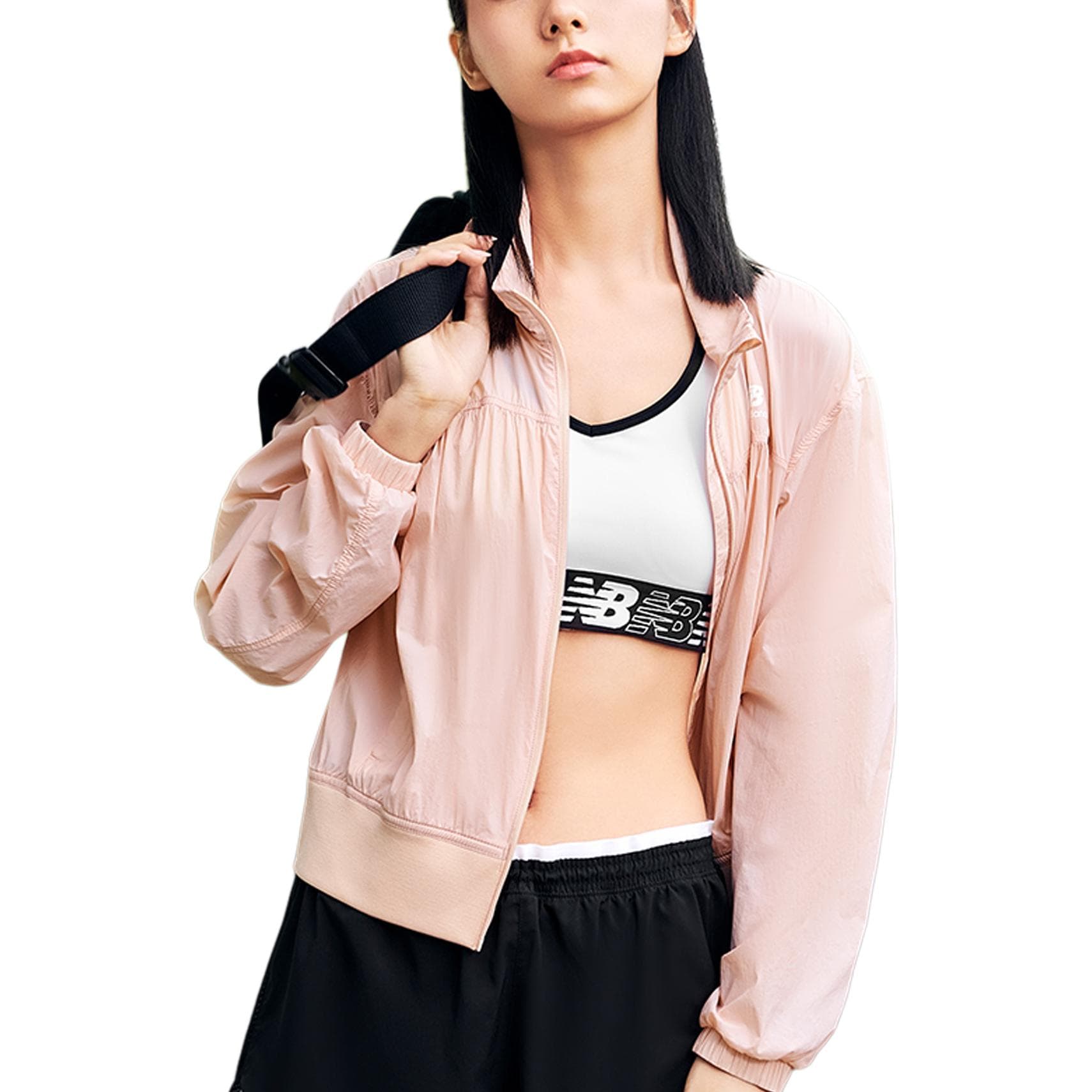 Куртки New Balance IU женские кораллово-красные